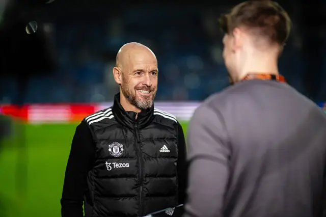 Erik ten Hag smiles