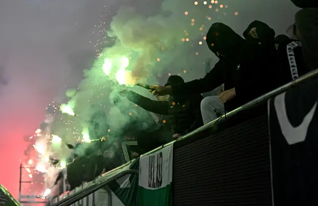 Hungarian fans light flares