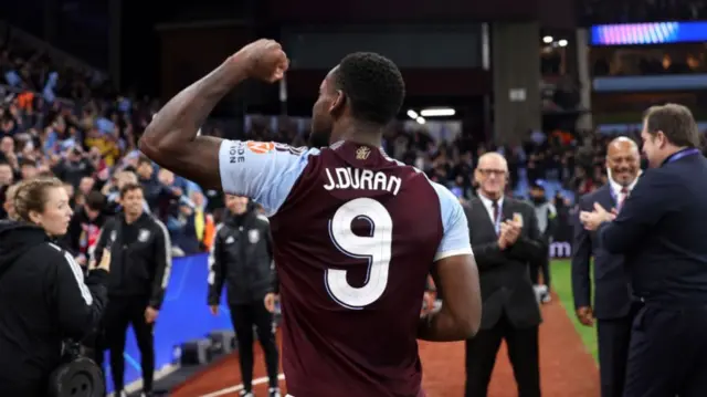 Jhon Duran salutes the Aston Villa fans after the team's win over Bayern Munich