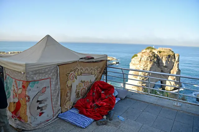 A makeshift tent by the water in Beirut