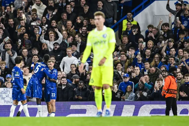 Dewsbury-Hall celebrates in front of Chelsea fans with teammates