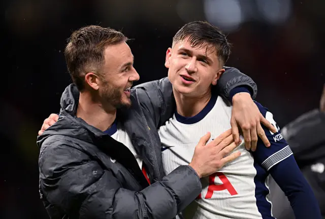 James Maddison of Tottenham Hotspur interacts with Mikey Moore