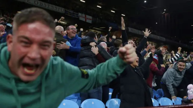 Aston Villa fans celebrate their team's victory over Bayern Munich