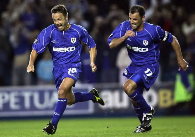 Dennis Wise of Millwall celebrates his goal with team captain Kevin Muscat