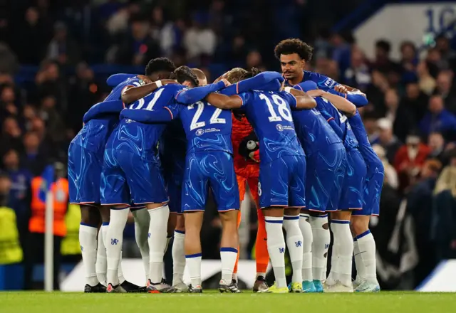 Chelsea players in a huddle