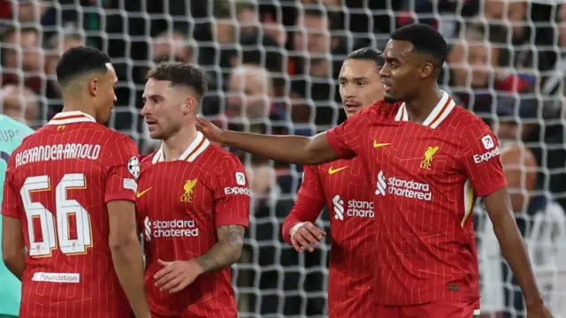 Liverpool's Ryan Gravenberch congratulates Alexis Mac Allister after his goal against Bologna