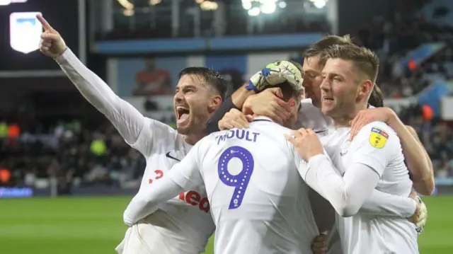 Preston players celebrate Louis Moult's goal against Aston Villa in October 2018