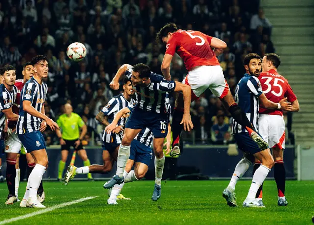 Harry Maguire of Manchester United scores their third goal