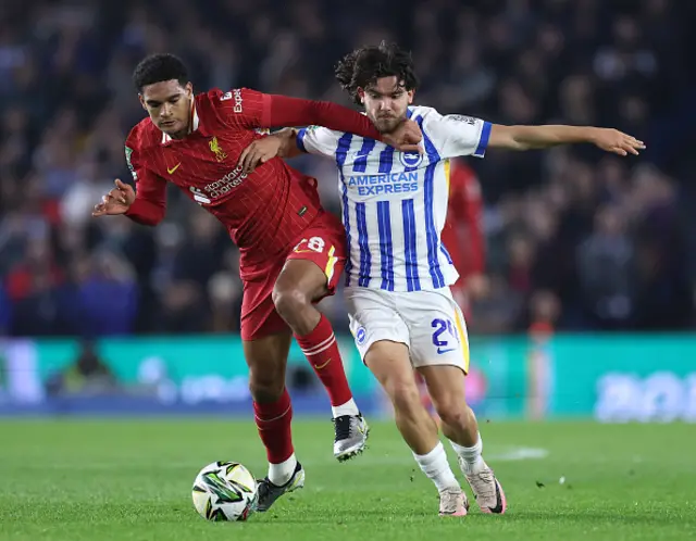 Jarell Quansah of Liverpool is challenged by Ferdi Kadioglu