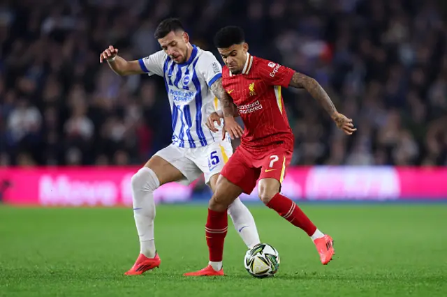 Luis Diaz of Liverpool is challenged by Jakub Moder