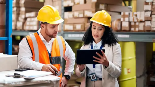 Man and a woman in a construction job