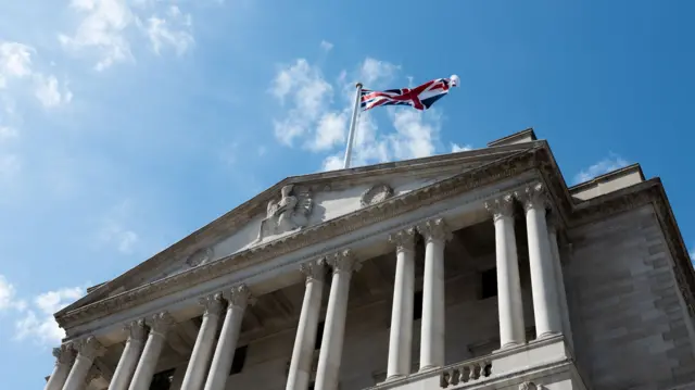 The Bank of England under a bright blue sky