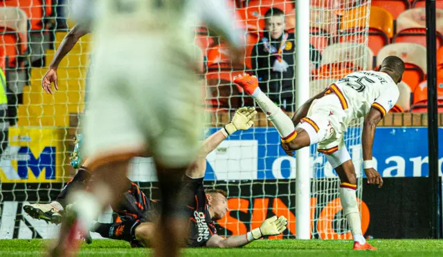 Motherwell's Tawanda Maswanhise scores to make it 2-1 during a William Hill Premiership match between Dundee United and Motherwell