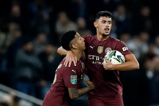 Matheus Nunes (R) celebrates