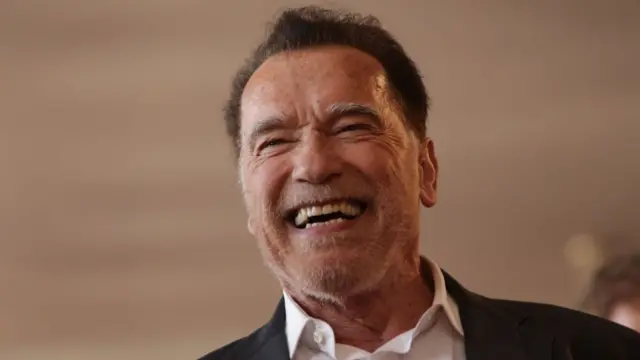 Arnold Schwarzenegger smiling