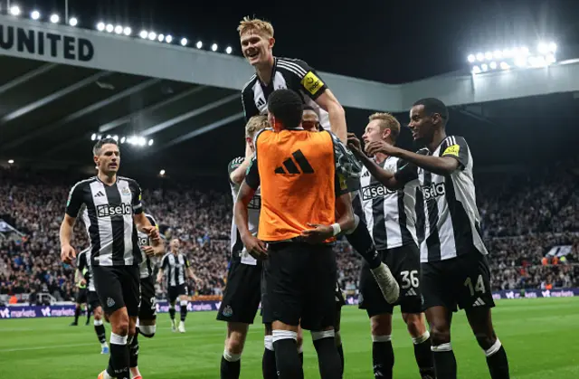 Newcastle players celebrate after Axel Disasi of Chelsea (2) scored an own goal