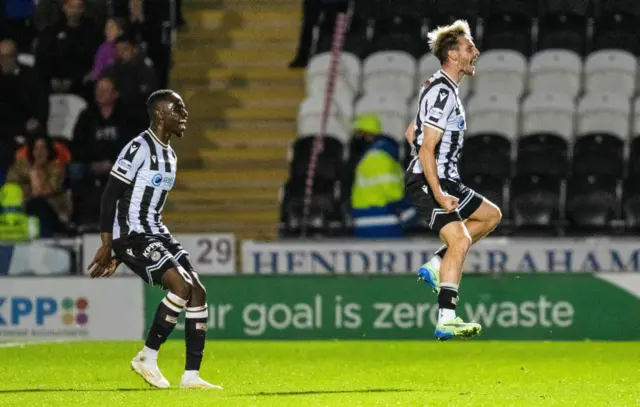 Scott Tanser (right) celebrates a fantastic goal