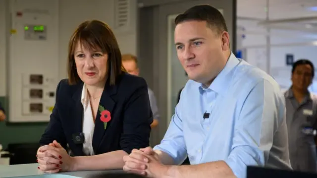 Chancellor of the Exchequer Rachel Reeves and Health Secretary Wes Streeting speak with members of the staff as they visit St. George's Hospital