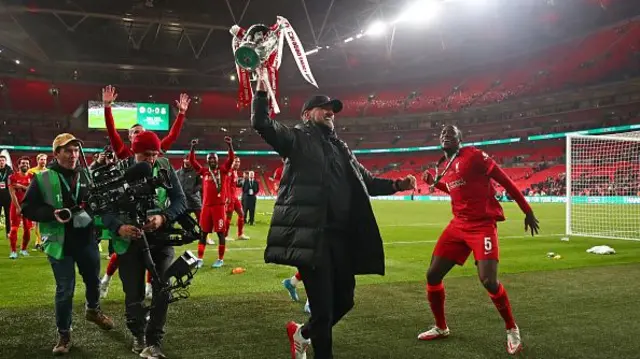 Former Liverpool manager Jurgen Klopp celebrates with the Carabao Cup