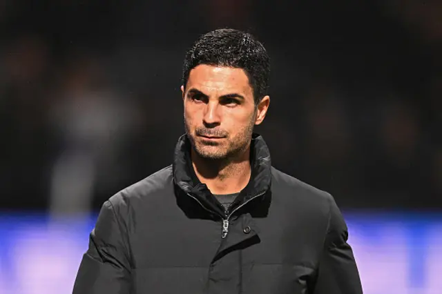 Mikel Arteta looks on