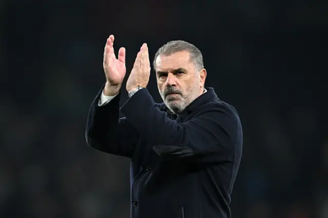 Ange Postecoglou, Manager of Tottenham Hotspur, applauds the fans