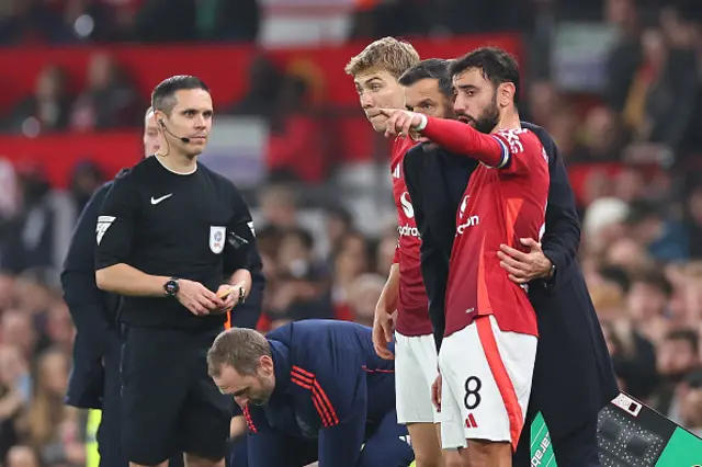 Bruno Fernandes of Manchester United and Ruud van Nistelrooy the interim head coach