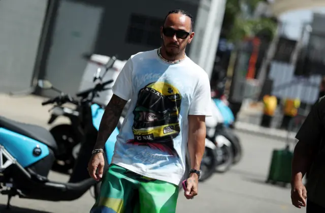 Lewis Hamilton wears an Ayrton Senna T-shirt in Brazil