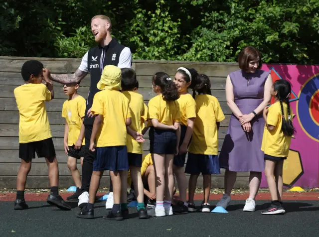 Ben Stokes hold a coaching session at a primary school