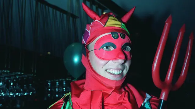 Mike Atherton in fancy dress as a devil