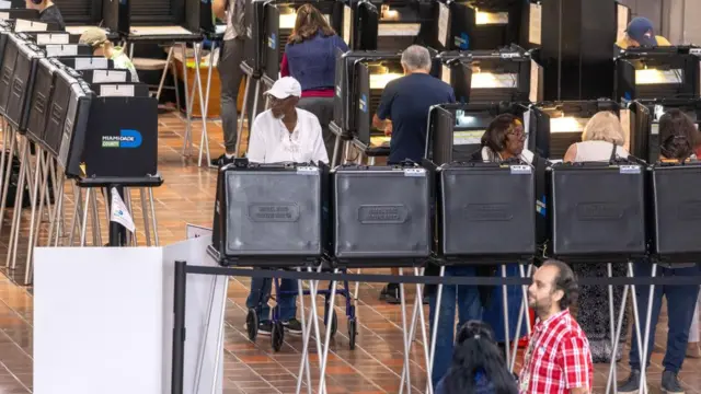 People vote on Florida's first early voting day for the 2024 presidential election in Florida