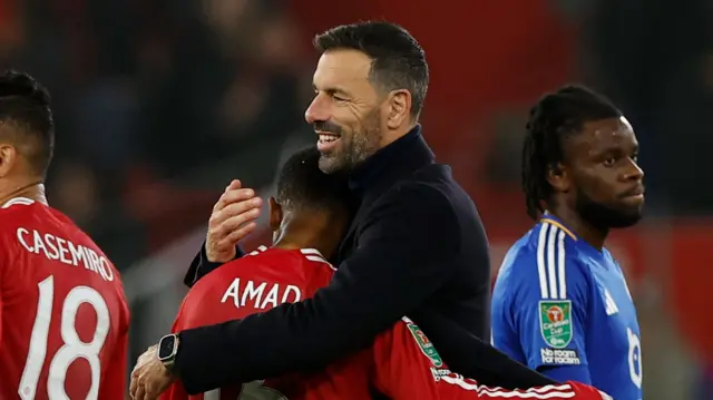 Ruud van Nistelrooy hugs Amad Diallo after Manchester United's win over Leicester