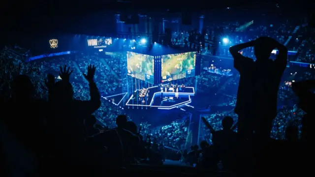 Spectators cheer on as they watch T1 compete against GEN.G at Adidas Arena in Paris