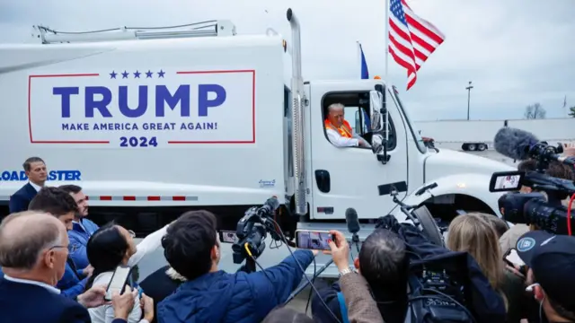 Donald Trump on a garbage truck