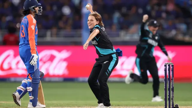 Eden Carson of New Zealand celebrates taking the catch to dismiss Shafali Verma of India