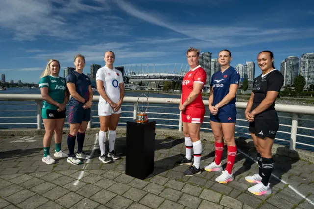 Edel McMahon of Ireland, Kate Zachary of the United States, Zoe Aldcroft of England, Tyson Beukeboom of Canada, Marine Ménager of France and Ruahei Demant of New Zealand pose for a photo during the Captains Photocall ahead of the WXV1