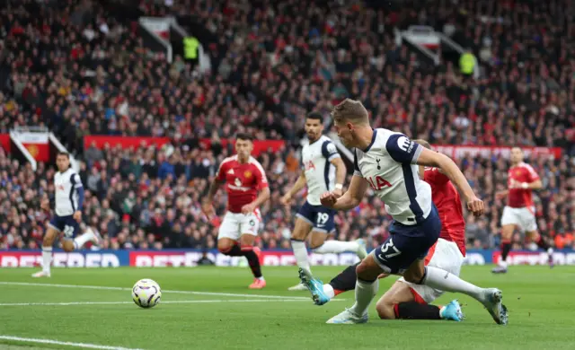 Tottenham in action at Manchester United