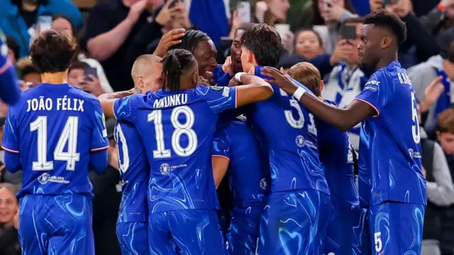 Chelsea's players celebrate Pedro Neto's goal against Gent