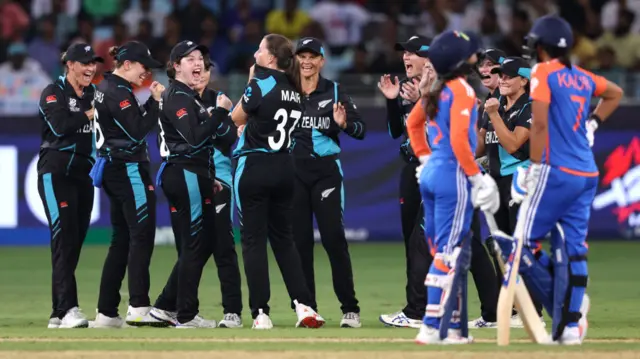 New Zealand players celebrate the wicket of Harmanpreet Kaur of India during the Women's T20 World Cup