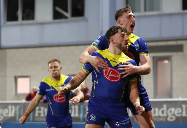 Warrington celebrate try