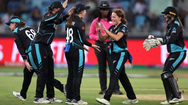 Eden Carson of New Zealand celebrates the wicket of Smriti Mandhana in the Women's T20 World Cup