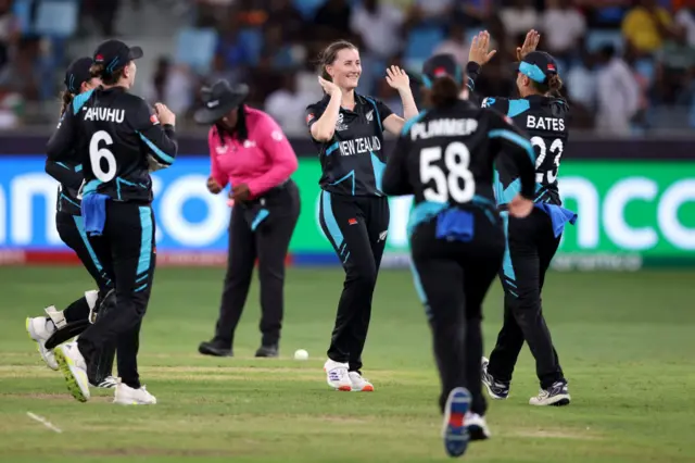 Rosemary Mair celebrates with her New Zealand team-mates