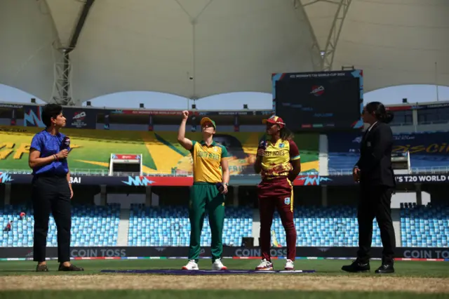 Laura Wolvaart and Hayley Matthews at the toss