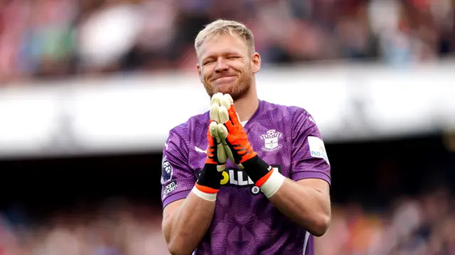 Southampton goalkeeper Aaron Ramsdale acknowledges the Arsenal fans after the final whistle in the Premier League match at the Emirates Stadium, London.