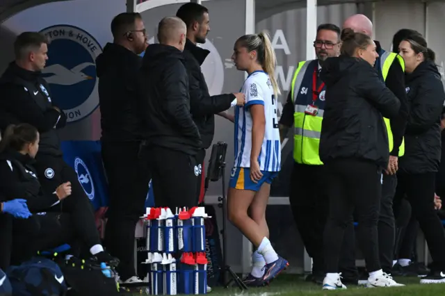 Pattinson walks down the tunnel after being sent off