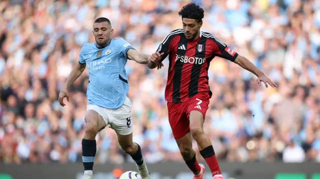 Raul Jimenez of Fulham (R) in action against Mateo Kovacic of Manchester City (L) during the English Premier League soccer match between Manchester City and Fulham FC in Manchester, Britain, 05 October 2024.