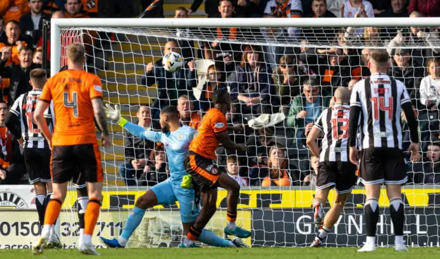 Dundee United's Emmanuel Adegboyega scores to make it 1-0 during a William Hill Championship match between St Mirren and Dundee United at the SMiSA Stadium