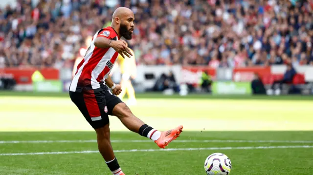 Brentford's Bryan Mbeumo scores their second goal from the penalty spot