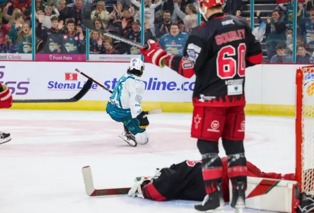 Elijah Barriga skates away after scoring against the Devils