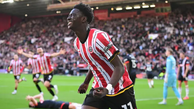 Jesuran Rak-Sakyi of Sheffield United celebrates