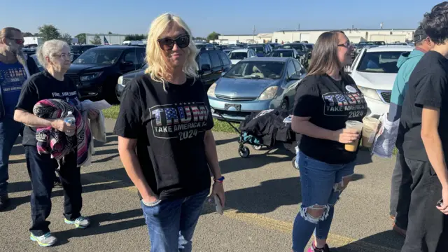 Marann Moore, an Ohio resident, speaks to the BBC wearing a pro-Trump T-shirt